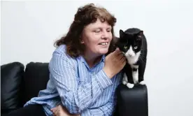  ??  ?? Kerry O’Hara reunited with her cat, Rosey, two months after the Grenfell Tower fire. Photograph: Teri Pengilley for the Guardian