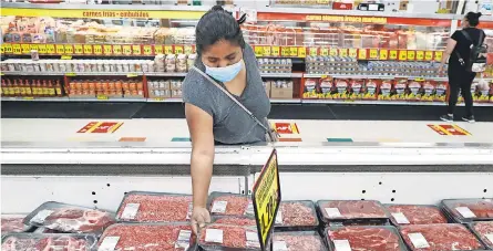  ??  ?? “We’re not going to run out of meat,” one economist says. But with slaughterh­ouses across the U. S. closing or cutting production, customers might see shortages at stores, depending on which supplier the grocer uses. LM OTERO/ AP