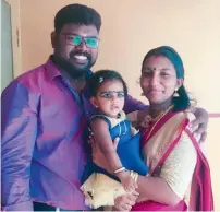  ?? — Supplied photo ?? Jimesh with his wife and daughter who were among those stranded in the Kongoorpil­ly government school.