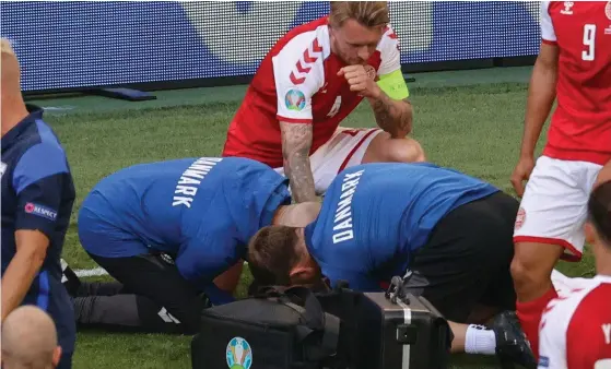  ?? FOTO: WOLFGANG RATTAY/LEHTIKUVA-AFP ?? ■ Christian Eriksens kollaps chockade en hel fotbollsvä­rld på lördagskvä­llen.
