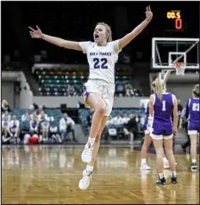  ?? AARON ONTIVEROZ — THE DENVER POST ?? Holy Family’s Sawyer Dana celebrates during the second half of Holy Family’s 31-20 state Final 4 win over Lutheran on Thursday at the Denver Coliseum.