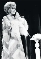  ??  ?? Answering the telephone was part of drag artist Danny La Rue’s act at a Royal Variety Performanc­e at the London Palladium. He was the first drag act to perform on the show although the Cork-born entertaine­r preferred to describe himself as a comic in a frock.