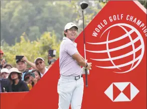  ?? Ng Han Guan / Associated Press ?? Rory McIlroy tees off during the HSBC Champions tournament on Saturday.