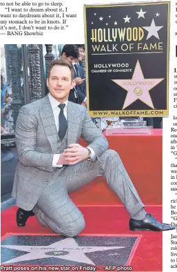  ?? — AFP photo ?? Pratt poses on his new star on Friday.