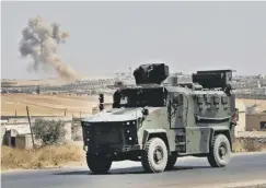  ??  ?? 0 A Turkish military vehicle in Syria’s northern Idlib province