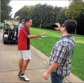  ?? ISAAC AVILUCEA — THE TRENTONIAN ?? Trenton Police Director Ernest Parrey Jr. (right) golfing with former PBA President George Dzurkoc at the Jasna Polana private golf club in Princeton on Monday following this weekend’s violence.