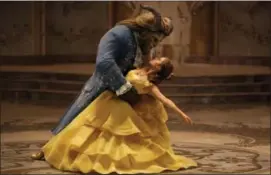  ?? DISNEY VIA AP, FILE ?? This file image released by Disney shows Dan Stevens as The Beast, left, and Emma Watson as Belle in a live-action adaptation of the animated classic “Beauty and the Beast.”