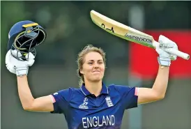  ?? — AP ?? England’s Natalie Sciver celebrates her century against Pakistan during the ICC Women’s World Cup at Grace Road in Leicester on Tuesday. England made 377/7 in 50 overs.