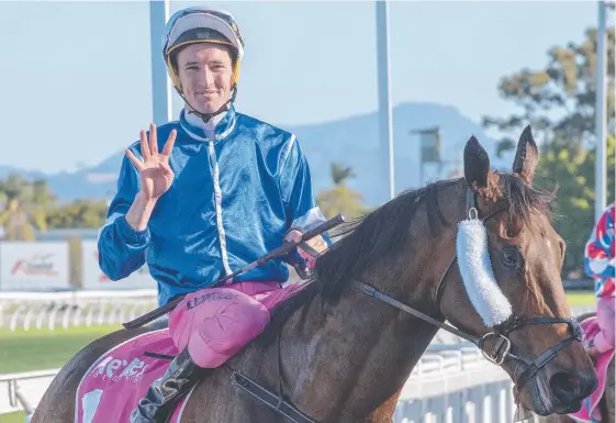  ?? Picture: GREG IRVINE/MAGIC MILLIONS ?? Ryan Plumb reveals the score after winning on the Les Kelly-trained Aggravate at the Gold Coast.