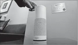  ?? ASSOCIATED PRESS] [ELAINE THOMPSON/THE ?? Sears’ agreement to sell appliances on Amazon.com includes smart appliances that can be synced to Amazon’s Alexa device.