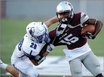  ?? Andy Shupe/NWA Democrat-Gazette ?? Siloam Springs receiver Primo Agbehi, right, reaches to fend off Rogers defensive back Clay Workman during the first half Friday at Panther Stadium in Siloam Springs.