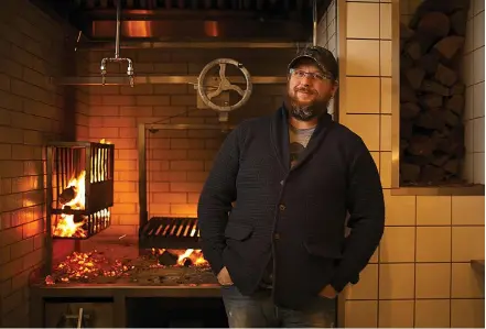  ?? Minneapoli­s Star Tribune/TNS ?? ■ Chef/owner Erick Harcey in the kitchen of his restaurant, Upton 43.