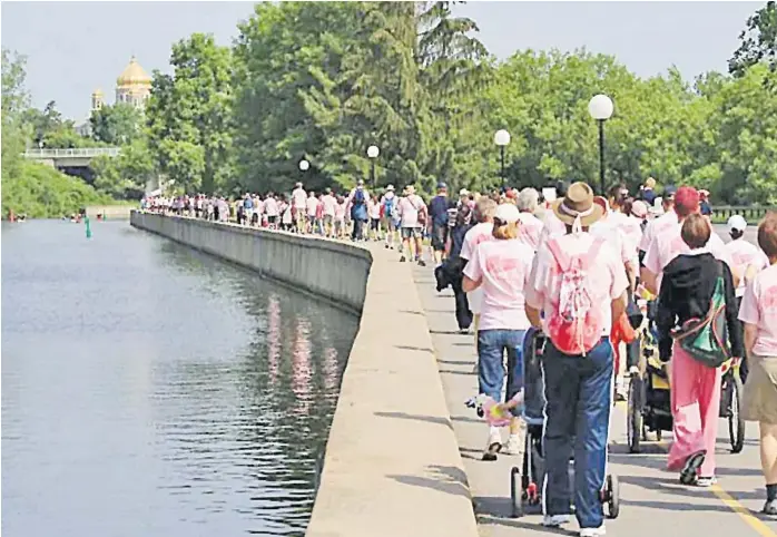  ?? Picture: BRITANNICA.COM ?? Participan­ts engage in a walk against breast cancer, held along the Rideau Canal in Ottawa, Ontario, Canada, to raise funds to support breast cancer research and increase awareness of the disease.