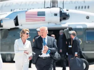  ?? SAUL LOEB/AFP/GETTY IMAGES ?? Donald Trump talks with U.S. Ambassador to Canada Kelly Knight as he departs the G7 Saturday.