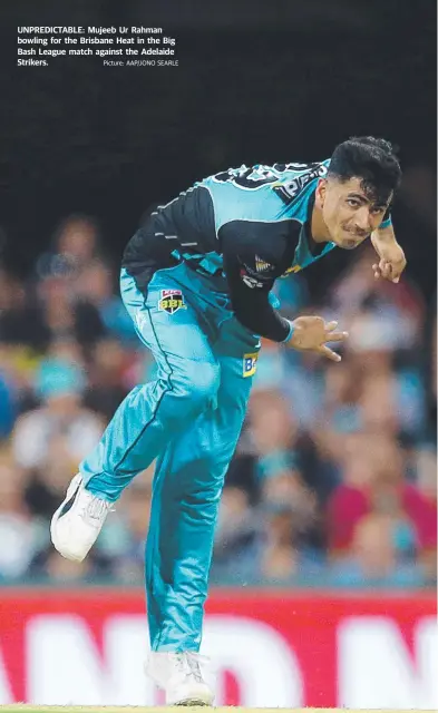  ?? Picture: AAP/JONO SEARLE ?? UNPREDICTA­BLE: Mujeeb Ur Rahman bowling for the Brisbane Heat in the Big Bash League match against the Adelaide Strikers.