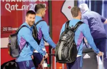  ?? PHOTO BY ODD ANDERSEN/AFP ?? Argentina’s Lionel Messi and teammates arrive at the Hamad Internatio­nal Airport in Doha on Thursday, Nov. 17, 2022, ahead of the Qatar 2022 World Cup football tournament. MESSI’S HERE