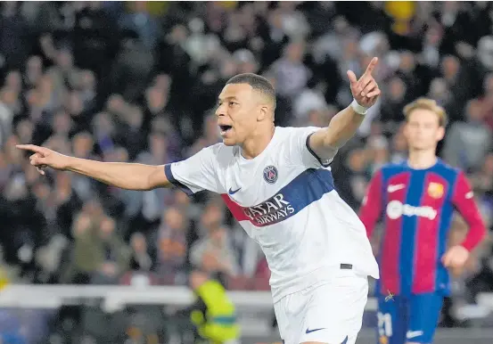  ?? Photo / AP ?? Kylian Mbappe celebrates scoring PSG’s third goal in the Champions League quarter-final in Barcelona yesterday.