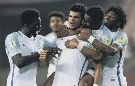  ??  ?? Dominic Solanke celebrates scoring for the Under-20s as they reached the World Cup Final by beating Italy 3-1