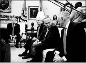  ?? ALEX BRANDON/AP ?? Senate Minority Leader Chuck Schumer, center, talks in the White House with Defense Secretary Jim Mattis.