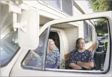  ?? PHOTOS BY JOSIE LEPÉ— STAFF PHOTOGRAPH­ER ?? Teresa Villasana, 84, and her daughter Aida Barron, 58, move their 1979Dodge RV from a parking spot in Gilroy. Barron usually stays at the Thousand Trails RV park in Morgan Hill, closed because of flood damage, and one in San Benito.