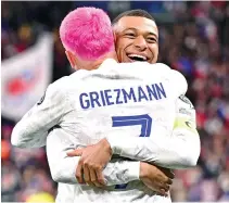  ?? ?? Kylian Mbappe and Antoine Griezmann scored in France’s win