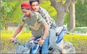  ?? HT PHOTO ?? The two bikers were riding a stolen Pulsar motorcycle when they were chased and caught by police.