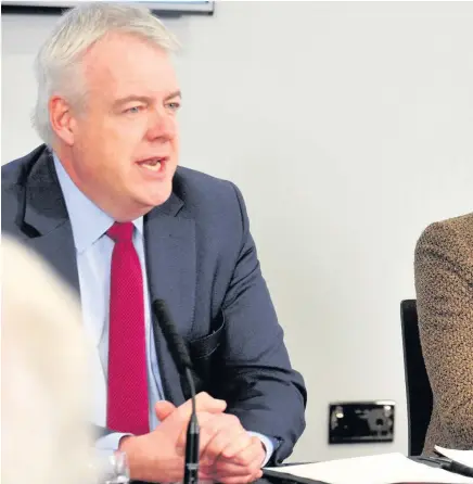  ??  ?? > Prime Minister Theresa May with First Minister Carwyn Jones, left, and Secretary of State for Wales Alun Cairns at