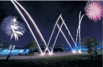  ?? SPECIAL TO POSTMEDIA NEWS ?? Wonder Woman's initials were part of the Victoria Day fireworks over the falls Monday night. It was part of a Warner Brothers promotion with Niagara Parks Commission and Niagara Falls Comic Con.