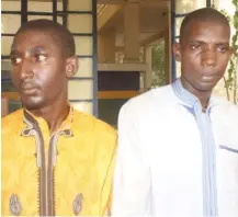  ??  ?? Abubakar Saidu and Adamu Haruna, the two suspected kidnappers paraded by the Police in Katsina.