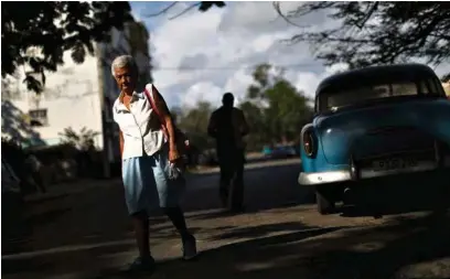  ?? (UESLEI MARCELINO/ REUTERS) ?? Alamar, banlieue de La Havane qui vit dans une extrême pauvreté et dans un décor urbain hérité du passé soviétique.
