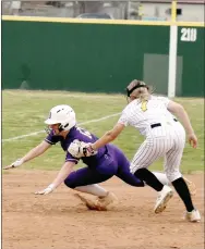  ?? MARK HUMPHREY ENTERPRISE-LEADER ?? Prairie Grove sophomore Kaylee Kincaid, playing shortstop, tags out Berryville’s Emily Utt before she can get to third. Utt doubled to lead off the top of the seventh with the Lady Bobcats leading 5-2, but was put out when LoraGrace Hill hit into a fielder’s choice and Kincaid had the presence of mind to tag out the lead runner instead of throwing to first. Berryville coach Josh Hatfield felt the base-running error cost the Lady Bobcats at least two runs and the game, which Prairie Grove rallied to win 6-5.