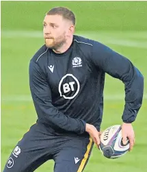  ??  ?? Left: Cameron Redpath in action for England Under-20s against their Scottish counterpar­ts in 2019; above: Scotland’s Finn Russell in training.