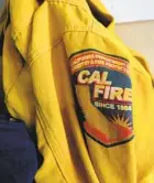  ?? ?? Firefighti­ng gear reflects that the station has been absorbed into San Diego County Fire, and staff now is employed by Cal Fire.