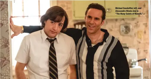  ?? AP ?? Michael Gandolfini, left, and Alessandro Nivola star in “The Many Saints of Newark.”