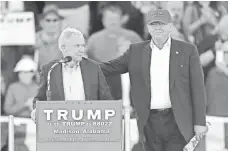  ?? JOHN BAZEMORE, AP ?? Presidenti­al candidate Donald Trump and Sen. Jeff Sessions, R-Ala., at a campaign rally in Madison last year.