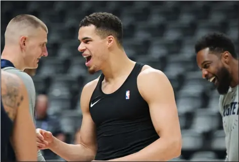  ?? HYOUNG CHANG — THE DENVER POST ?? From left, Nikola Jokic, Michael Porter Jr. and Jeff Green of the Denver Nuggets go through a team practice Wednesday at Ball Arena ahead of the NBA Finals against the Miami Heat.