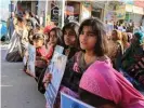  ??  ?? Families hold a protest against enforced disappeara­nces in Quetta, Balochista­n, where, despite assurances, the practice continues