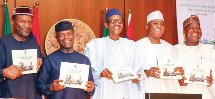  ??  ?? Presidet Buhari (M) Vice President Osinbajo (2nd left), Senate President Saraki (2nd right) Speaker Dogar (right) and Budget and National Planning Minister Udoma at the launch of ERGP in April