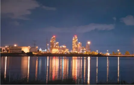  ?? (Mila Aviv/Flash90) ?? A NIGHT VIEW of Nesher factory, outside of Ramle.