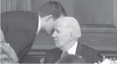  ?? AGENCE FRANCE PRESSE ?? WASHINGTON, DC - Jacob Spreyer, personal aide to U.S. President Joe Biden, speaks privately to the president during the annual Friends Of Ireland Speaker Luncheon at the U.S. Capitol in Washington, DC.