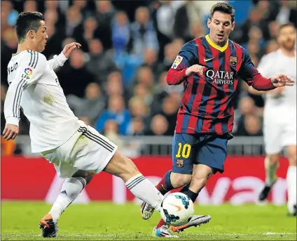  ?? Picture: GETTY IMAGES ?? INTER-GALACTICOS CLASH: Barcelona’s Lionel Messi, right, competes for the ball with Cristiano Ronaldo of Real Madrid during a La Liga match at Bernabeu in Madrid, Spain. Ronaldo and Messi will face off again when Real host Barcelona tomorrow