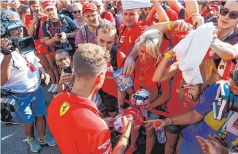  ?? FOTO: IMAGO ?? Die Stimmung beim womöglich letzten Deutschlan­d-GP hat sich gut angelassen für Sebastian Vettel.