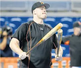  ?? WILFREDO LEE/AP ?? Miami’s Justin Bour, above, is one of five candidates in the NL Final Vote this week. He will go up against Cubs third baseman Kris Bryant, Nationals third baseman Anthony Rendon, Rockies first baseman Mark Reynolds and Dodgers third baseman Justin...