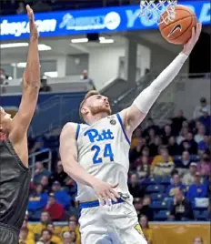  ?? Matt Freed/Post-Gazette ?? Ryan Murphy scores a layup Saturday for two of his teamhigh 28 points in Pitt’s 75-70 loss to Nicholls State.