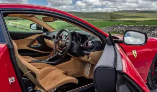  ??  ?? Top left: Ferrari test car’s interior colour scheme an acquired taste. Above left: driver sits low in the Aston’s elaborate cabin, enveloped by the dash