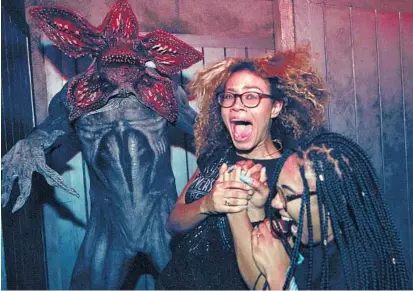  ?? PHOTOS COURTESY OF UNIVERSAL ORLANDO ?? A Demogorgon surprises guests at the Stranger Things haunted house during this year's Halloween Horror Nights at Universal Studios.
