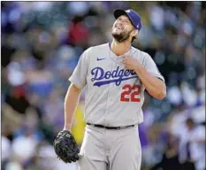  ?? David Zalubowski Associated Press ?? CLAYTON KERSHAW WAITS to be removed from the game after giving up his fourth single of the sixth inning against the Rockies.