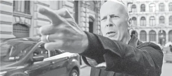  ?? METRO-GOLDWYN-MAYER PICTURES ?? Bruce Willis plays vigilante Paul Kersey, dubbed the Grim Reaper when a video of him goes viral, in a remake of 1974’s “Death Wish.”