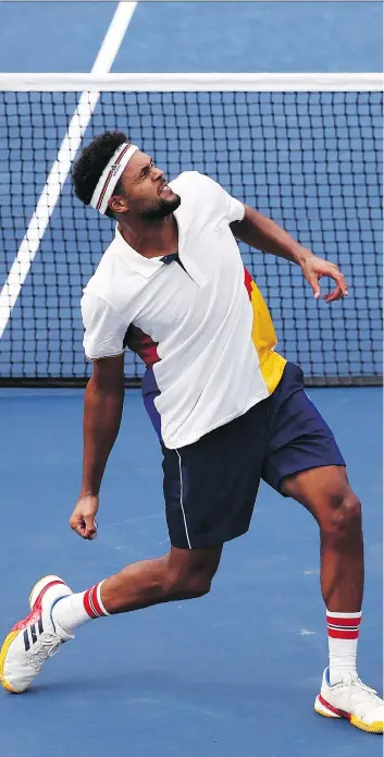  ?? AL BELLO/GETTY IMAGES ?? Jo-Wilfried Tsonga celebrates after winning his first-round U.S. Open match against Marius Copil on Monday in New York. The Frenchman will next face Denis Shapovalov, from Richmond Hill, Ont.