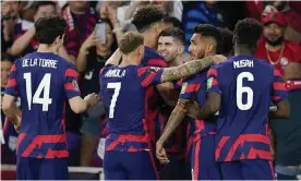  ?? ?? United States players celebrate Christian Pulisic’s second goal against Panama in their World Cup qualifier. Photograph: Julio Cortez/AP